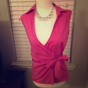 Pink sleeveless wrap blouse